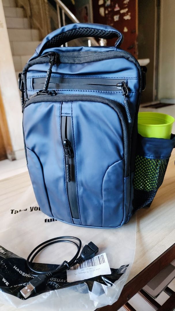 9. Freeknight Tas Selempang Travel USB Port Sling Bag Tas Slempang Pria Keren Multifungsi Cross Body Bag TS718 - Foto ulasan pembeli