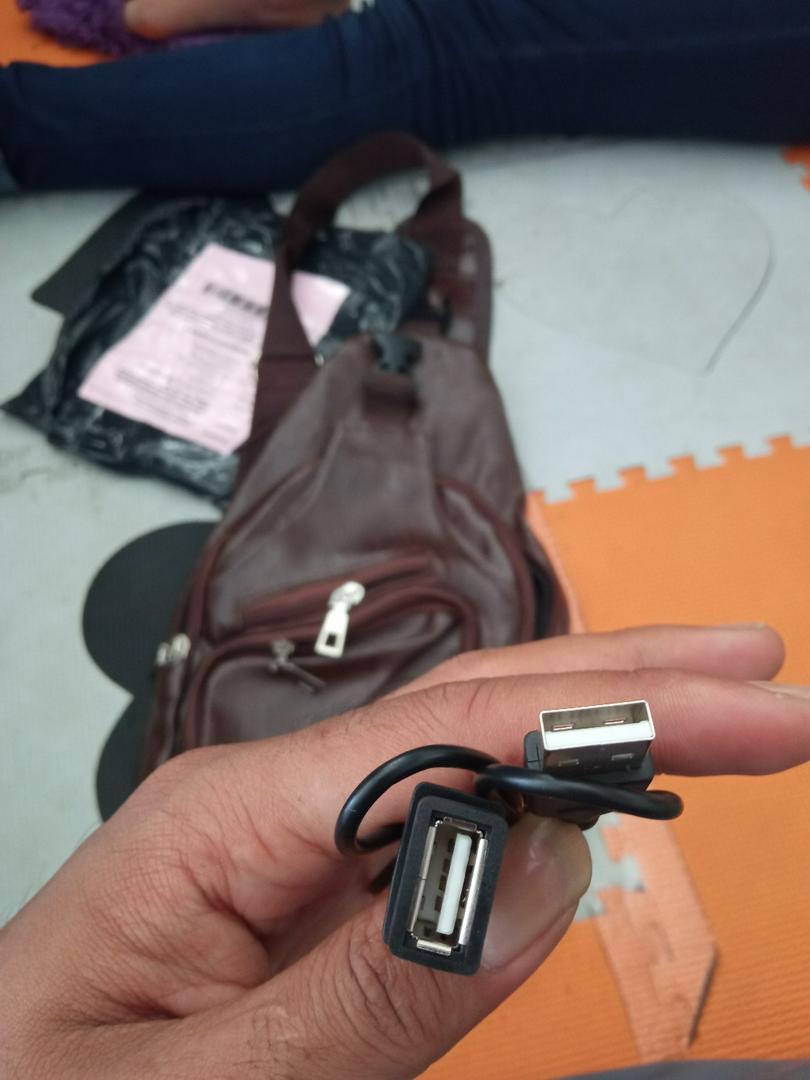 GOGOLAND Selempang Kulit Pria Usb Anti Air - Foto ulasan pembeli