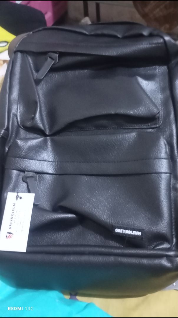 Foto ulasan pembeli rijal.jr1728, varian Hitam Kulit Premium