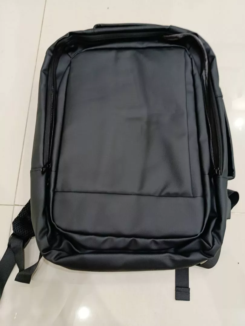 GuluCarrier Tas Ransel Pria Kantor Tahan Air Multifungsi Tas Laptop Travel Kapasitas Besar Original - Foto ulasan pembeli