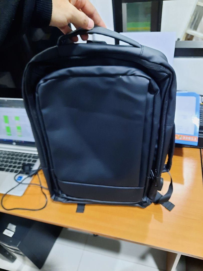 GuluCarrier Tas Ransel Pria Kantor Tahan Air Multifungsi Tas Laptop Travel Kapasitas Besar Original - Foto ulasan pembeli