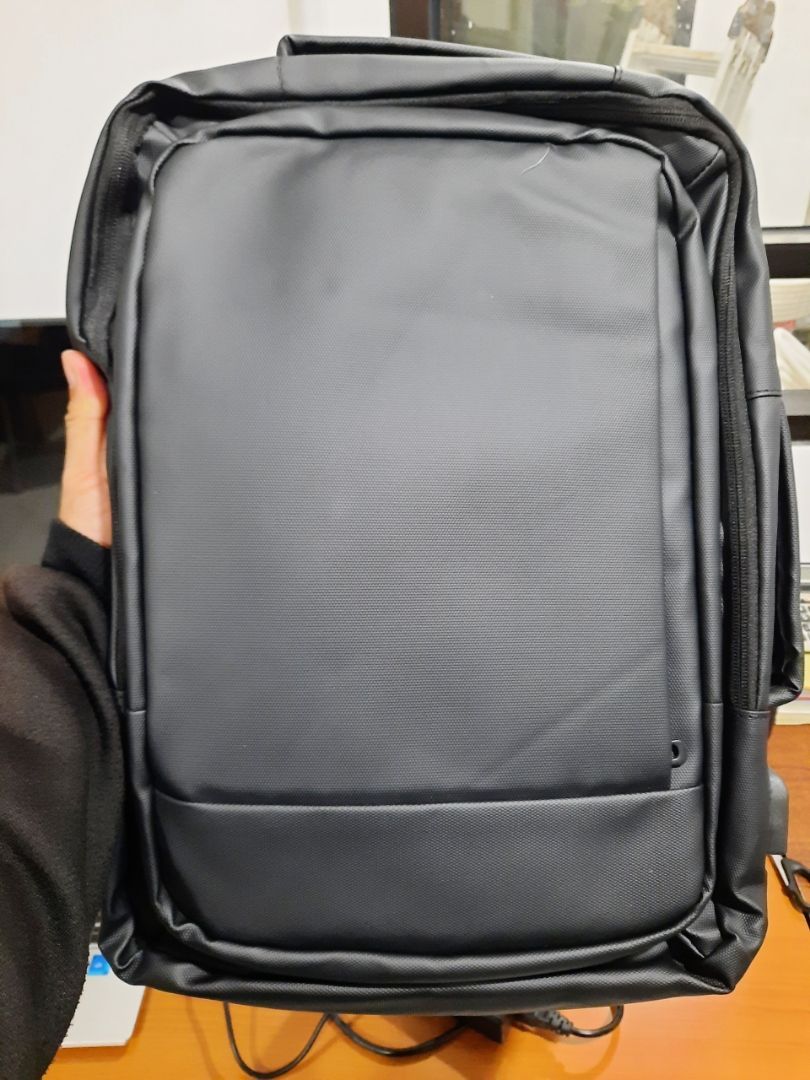 GuluCarrier Tas Ransel Pria Kantor Tahan Air Multifungsi Tas Laptop Travel Kapasitas Besar Original - Foto ulasan pembeli