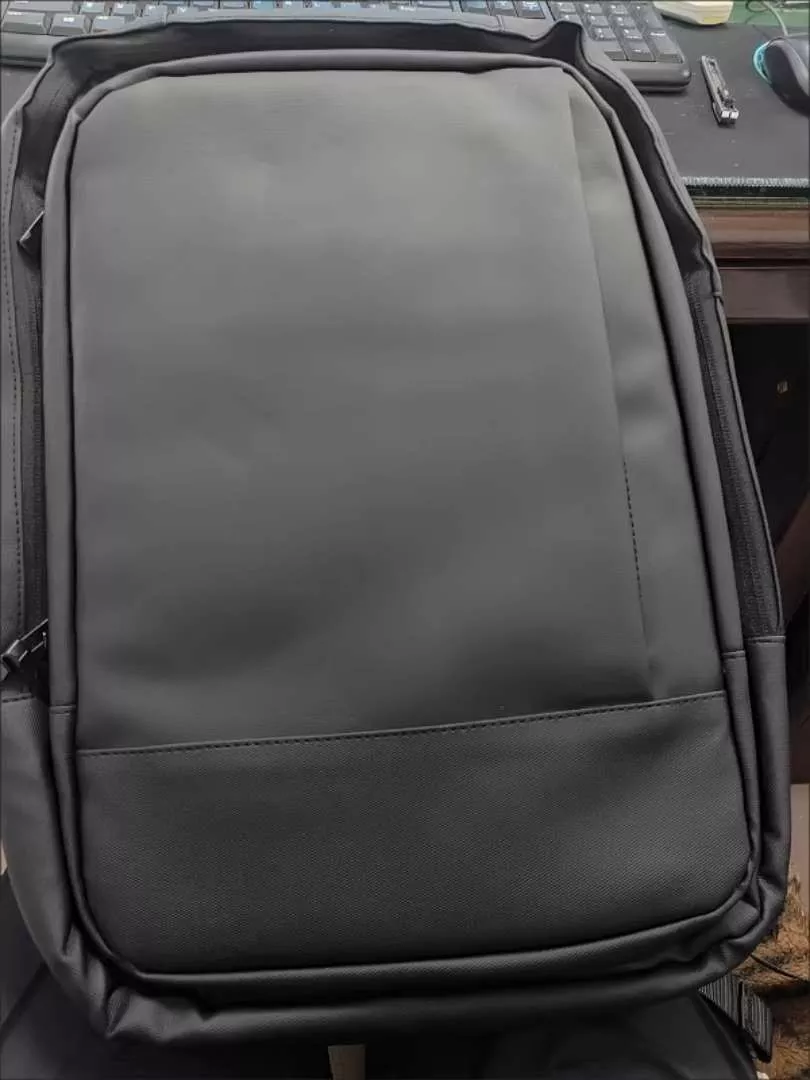 GuluCarrier Tas Ransel Pria Kantor Tahan Air Multifungsi Tas Laptop Travel Kapasitas Besar Original - Foto ulasan pembeli