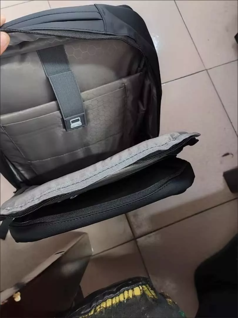 GuluCarrier Tas Ransel Pria Kantor Tahan Air Multifungsi Tas Laptop Travel Kapasitas Besar Original - Foto ulasan pembeli