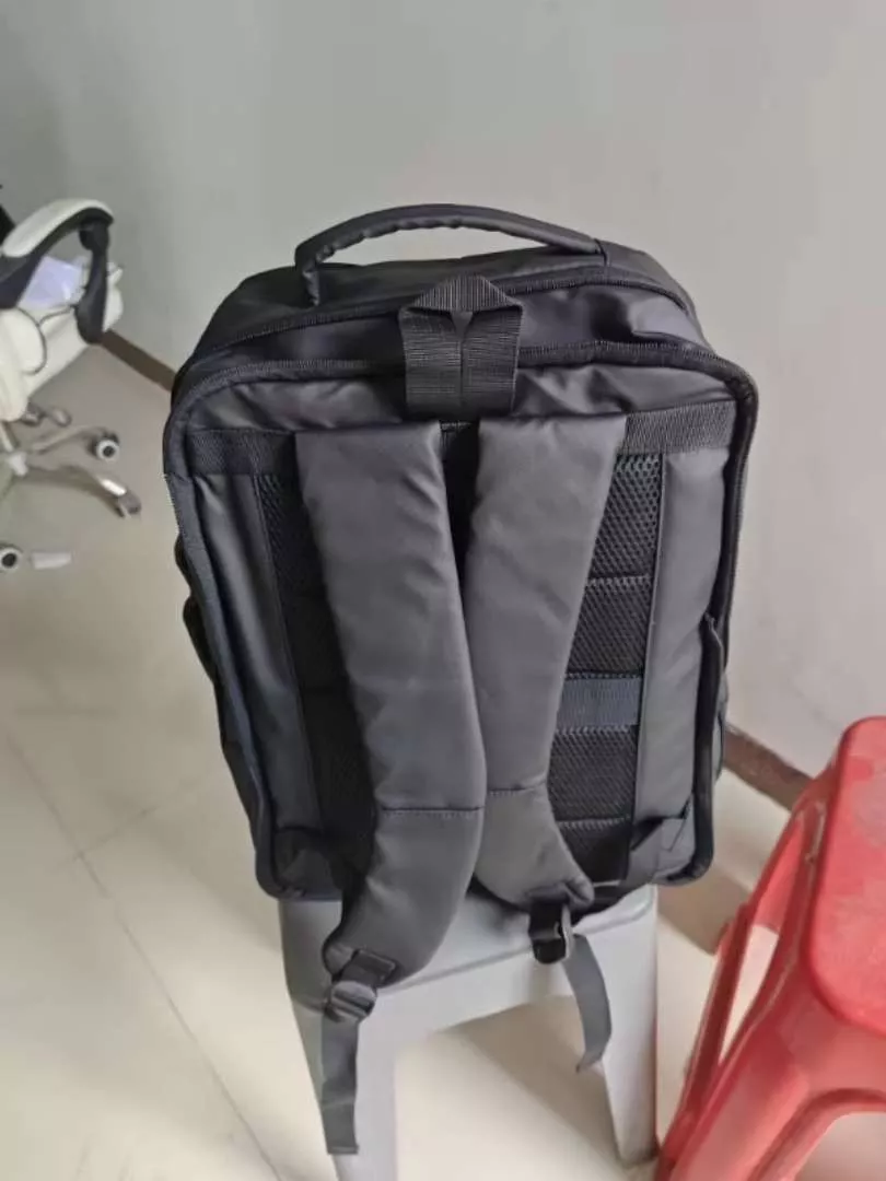 GuluCarrier Tas Ransel Pria Kantor Tahan Air Multifungsi Tas Laptop Travel Kapasitas Besar Original - Foto ulasan pembeli