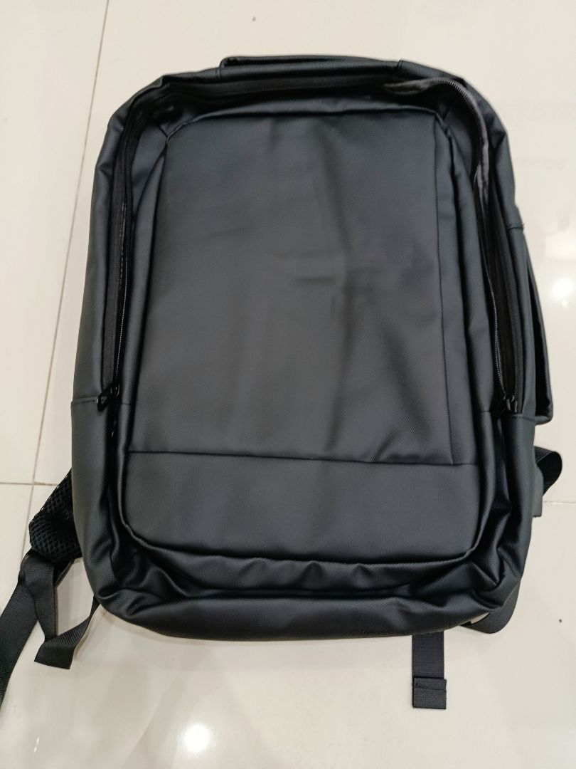 GuluCarrier Tas Ransel Pria Kantor Tahan Air Multifungsi Tas Laptop Travel Kapasitas Besar Original - Foto ulasan pembeli