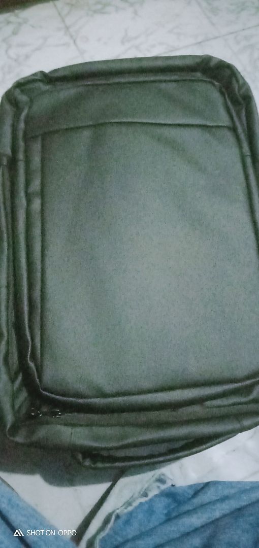 GuluCarrier Tas Ransel Pria Kantor Tahan Air Multifungsi Tas Laptop Travel Kapasitas Besar Original - Foto ulasan pembeli