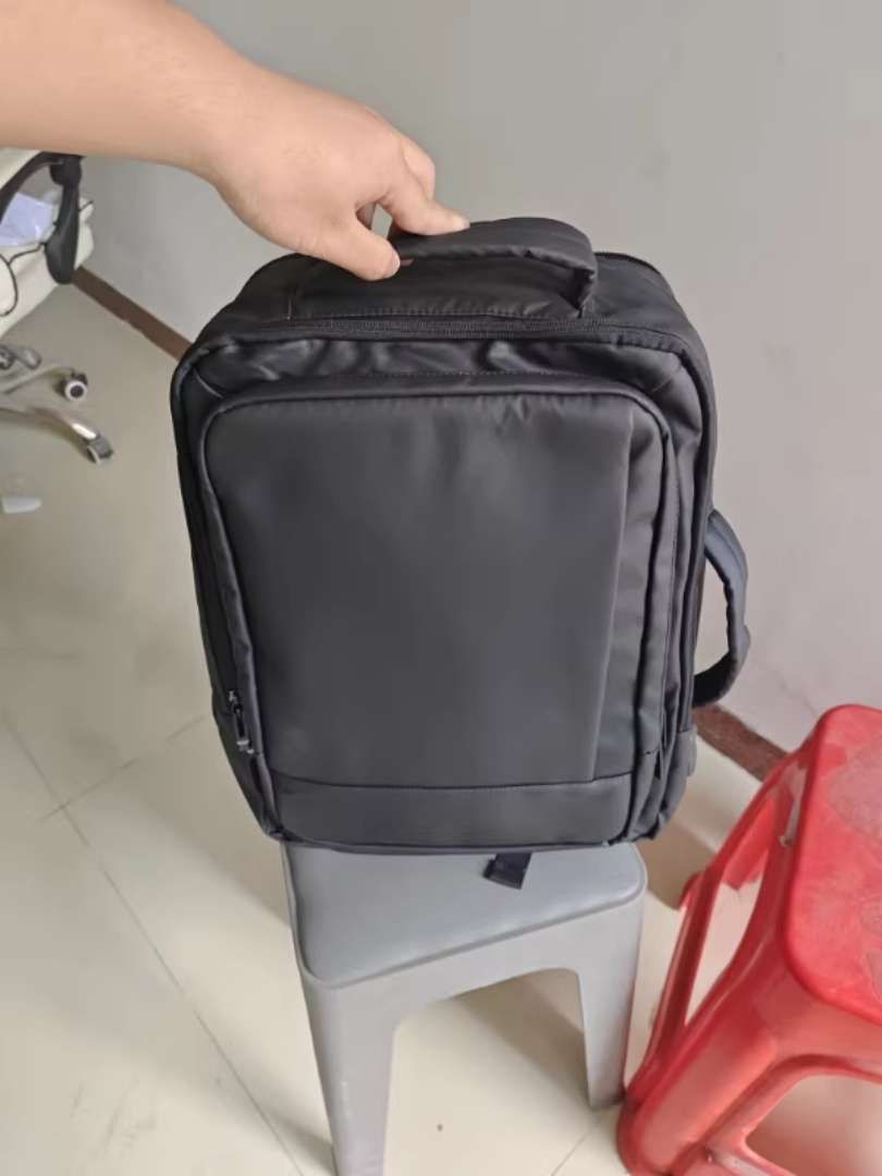 GuluCarrier Tas Ransel Pria Kantor Tahan Air Multifungsi Tas Laptop Travel Kapasitas Besar Original - Foto ulasan pembeli