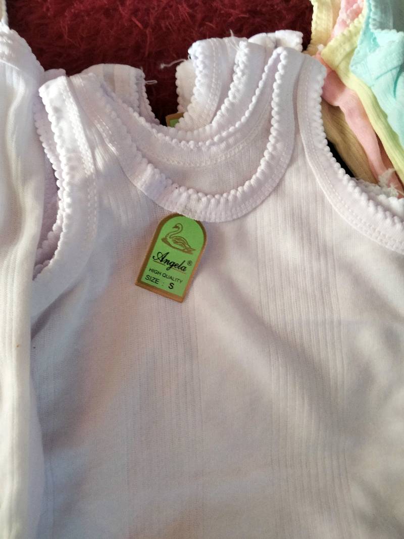 Foto ulasan pembeli k*****1, varian WARNA,SL Premium - M, Putih,SL Premium - XL, WARNA,SL Premium - S, ...
