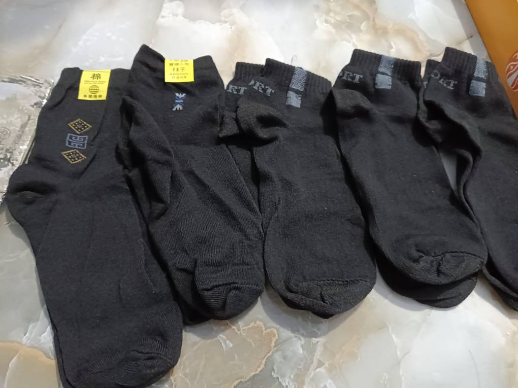 Foto ulasan pembeli h*****t, varian Hitam Motif