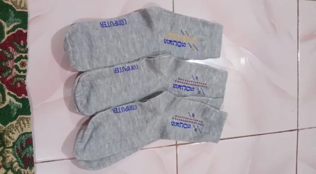 Foto ulasan pembeli edwarddevgan22, varian Abu Tua Motif, Hitam Motif