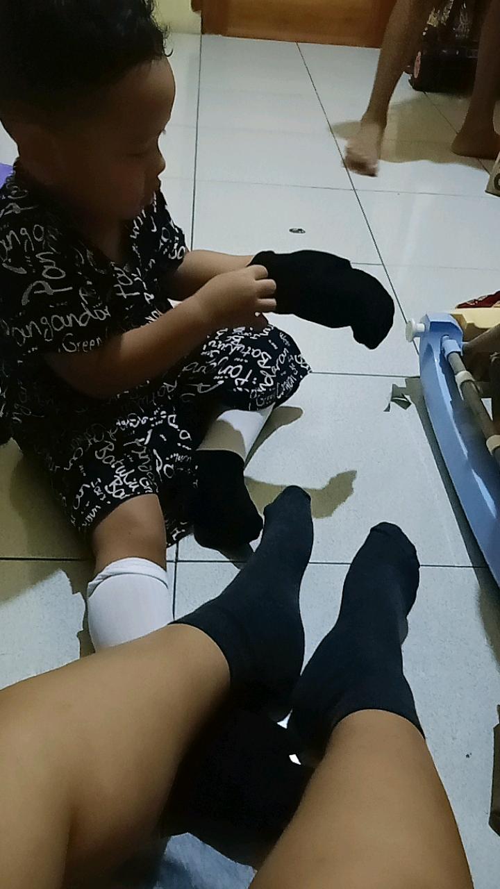 Foto ulasan pembeli k*****g, varian Hitam Motif