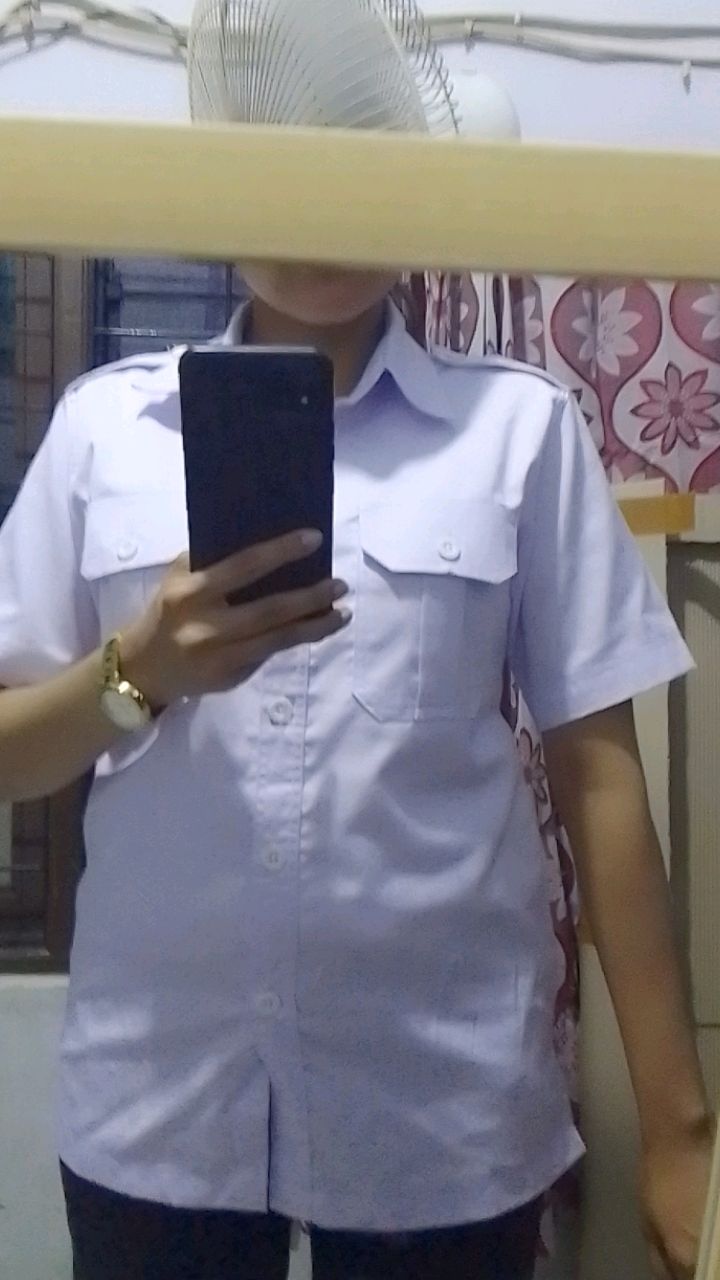 Foto ulasan pembeli nelianggrekmurni, varian TANGAN PENDEK,S