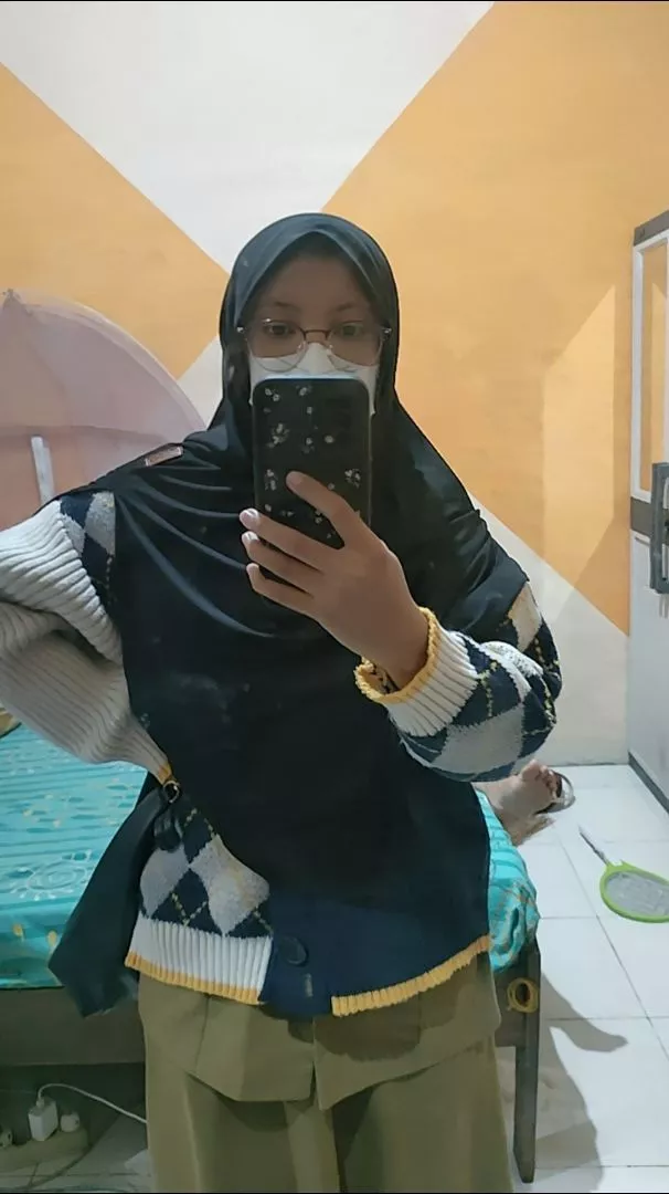 Foto ulasan pembeli hafitzhazn24, varian Hitam,L