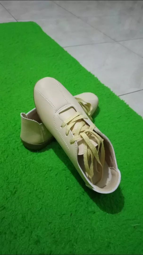 Foto ulasan pembeli mahalit72, varian Krem,38