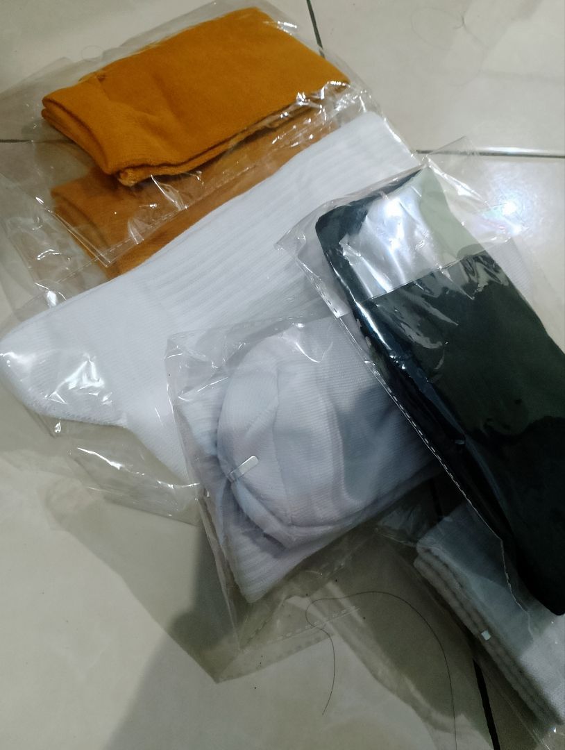 Foto ulasan pembeli m*****i, varian Putih Polos