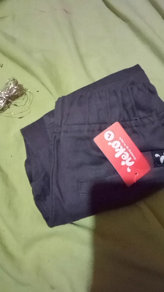 Foto ulasan pembeli y*****y, varian Abu-abu,L