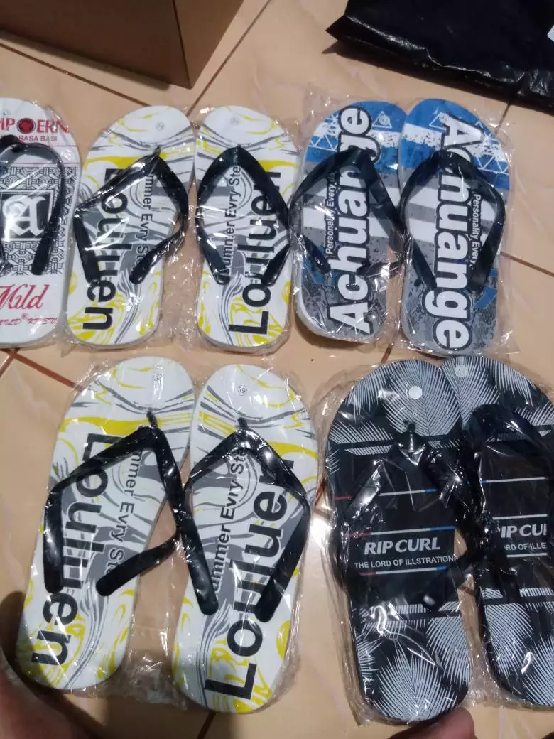 Sandal Jepit Pria Motif Achuange Bahan Spon - Foto ulasan pembeli