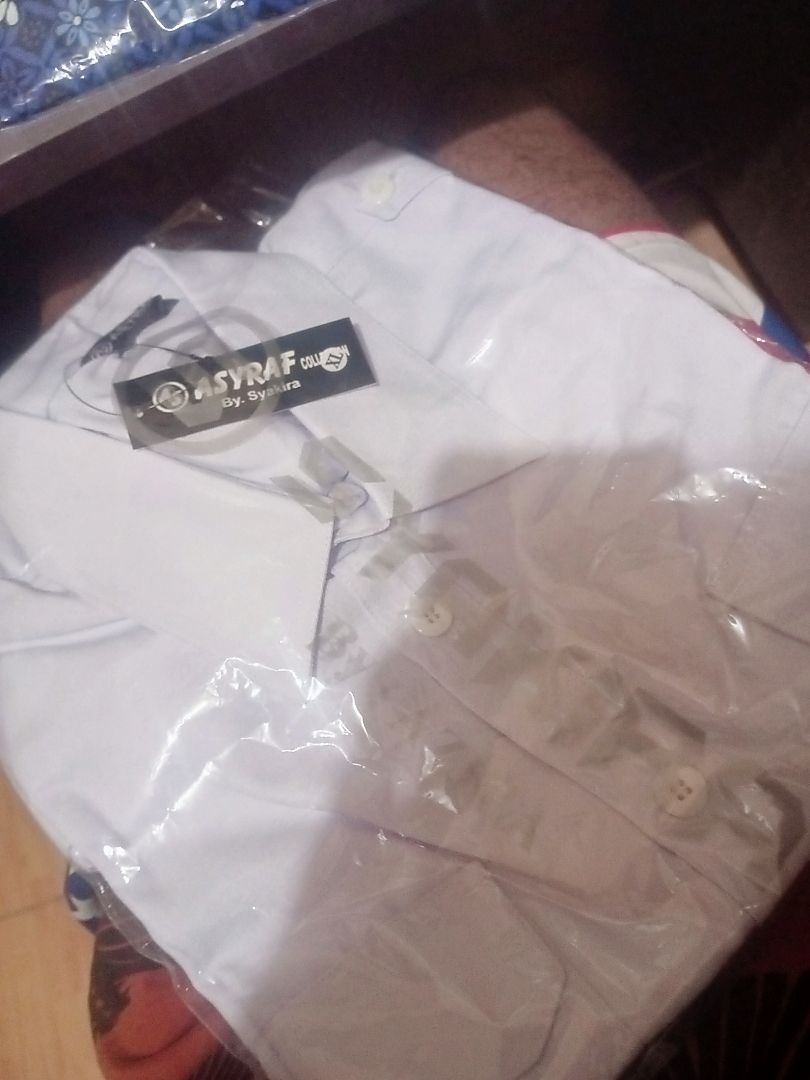 Seragam Kerja Pria Semi Wool Putih Reguler Fit - Foto ulasan pembeli