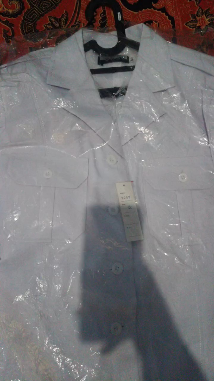 Seragam Kerja Pria Semi Wool Putih Reguler Fit - Foto ulasan pembeli