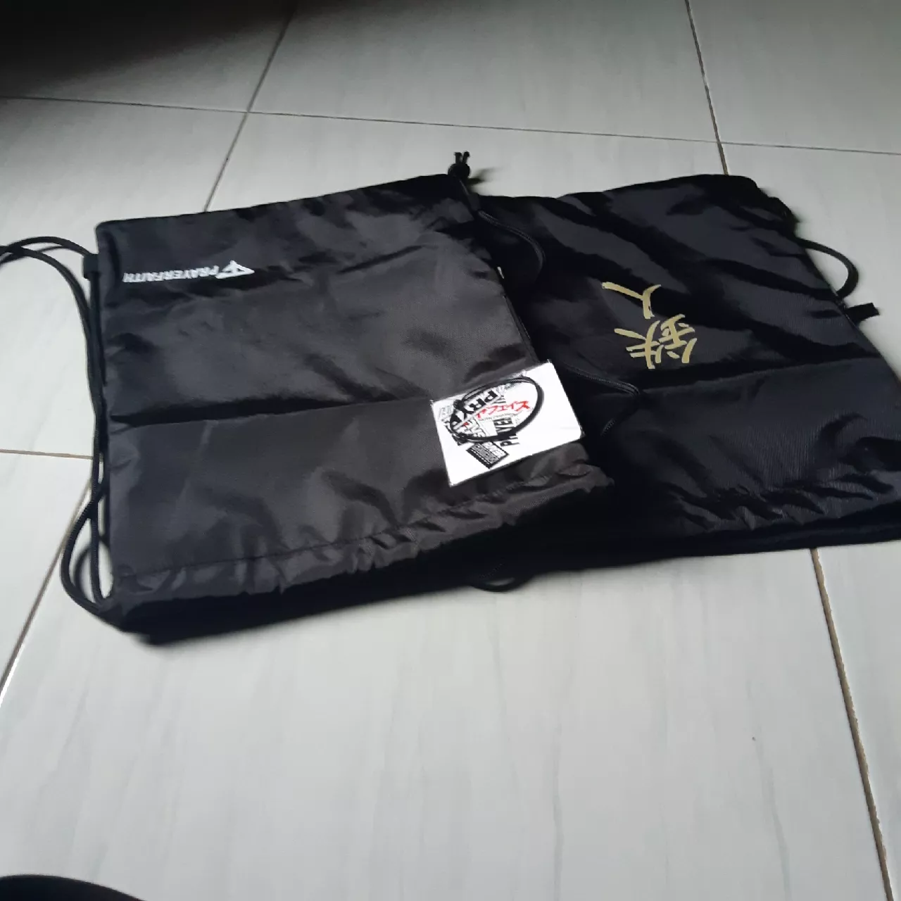 PRAYERFAIT - Tas Serut Pria Wanita Unisex Model Polos Hitam Original Tas Futsal Anti Air - Foto ulasan pembeli