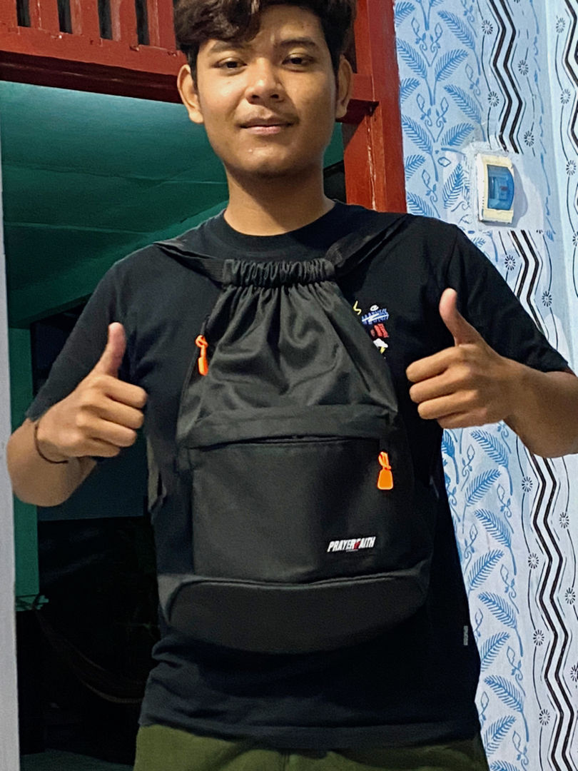 Foto ulasan pembeli a*****1, varian Hitam