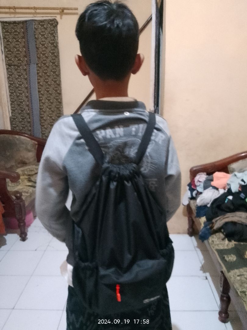 RHID - Tas Ransel Sekolah Pria Wanita Unisex Anti Air - Foto ulasan pembeli