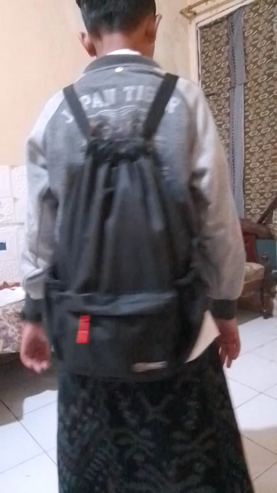 RHID - Tas Ransel Sekolah Pria Wanita Unisex Anti Air - Foto ulasan pembeli
