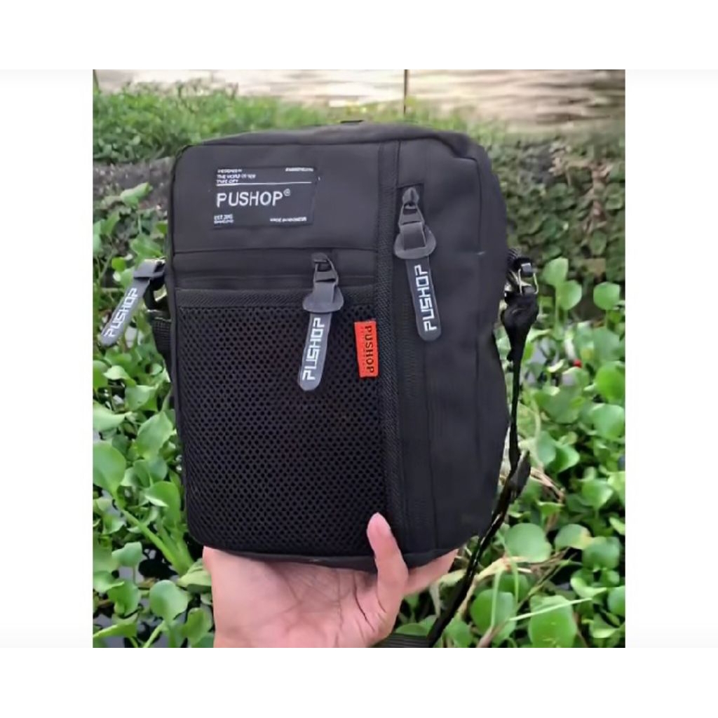 TAS SELEMPANG FULL BLACK KEKINIAN PRIA WANITA - foto 1 dari 10